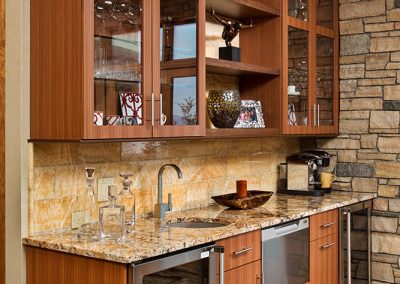 Custom wood grain wet bar cabinets with glass dorrs